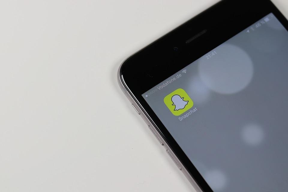 how do i access Spotlight on Snapchat